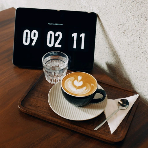 Original latte scene with digital clock text 09 02 11