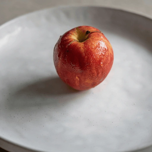 Edited apple on a plate